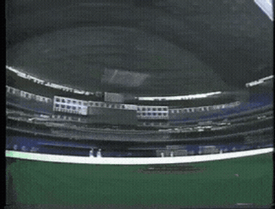 A Stadium With A Few Rows Of Seats And A Few Rows Of Stands GIF