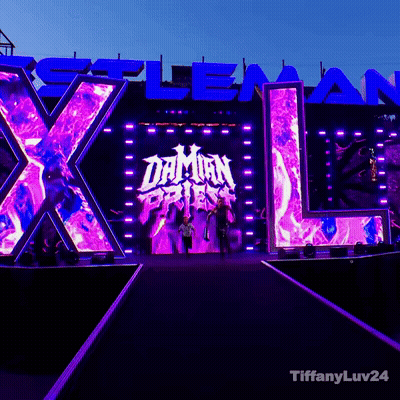 A Stage With A Large X And L And The Word Daman On It GIF