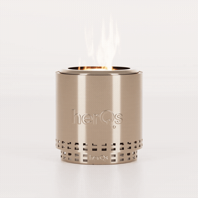 A Stainless Steel Candle Holder With The Word Herqs On It GIF