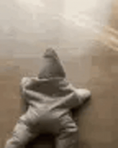 A Star Shaped Pillow Is Sitting On A Couch . GIF