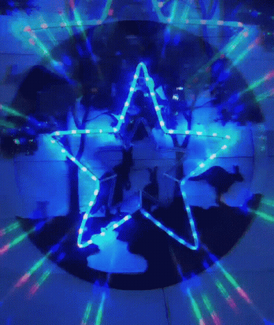 A Star With A Kangaroo On It Is Surrounded By Colorful Lights . GIF
