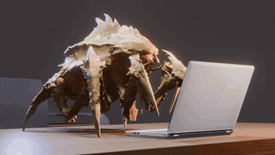 A Statue Of A Crab Looking At A Laptop On A Desk GIF