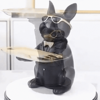 A Statue Of A Dog Wearing Sunglasses And A Suit Holding A Tray GIF