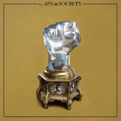 A Statue Of A Fist With The Ape Society Logo On The Bottom GIF