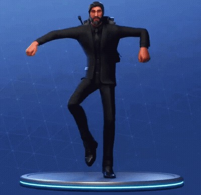 A Statue Of A Man In A Suit And Tie Is Dancing GIF