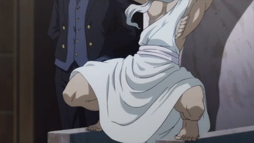 A Statue Of A Man In A White Toga Is Being Held By A Man In A Suit GIF