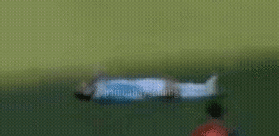 A Statue Of A Man Laying Down With The Word Monkey On The Bottom GIF