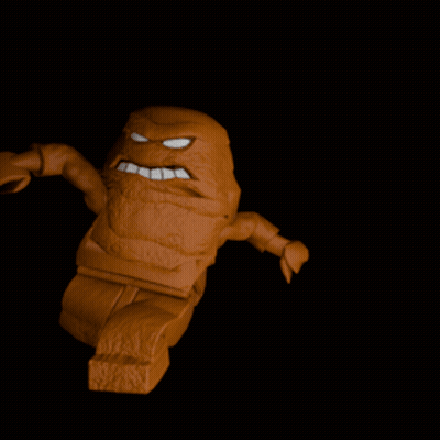 A Statue Of A Man 'S Arm With A Hammer On It GIF