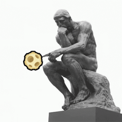 A Statue Of A Man Sitting On A Rock With A Cookie Coming Out Of His Hand GIF