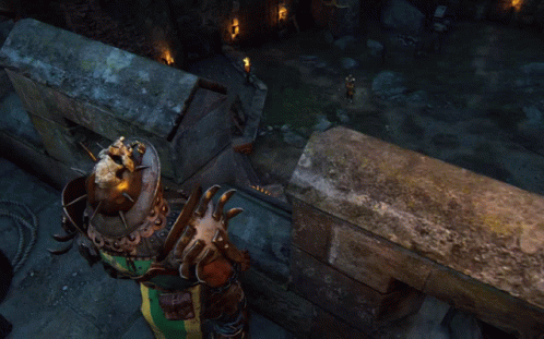 A Statue Of A Man With A Helmet And A Shield GIF
