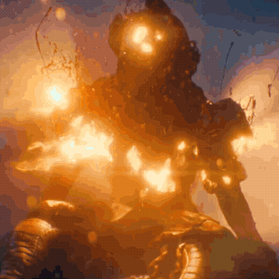 A Statue Of A Man With A Helmet On Is Surrounded By Flames GIF