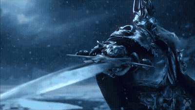 a statue of a man with a sword in his hand is in the water