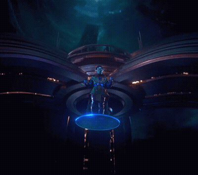 A Statue Of A Man With Blue Eyes Is Surrounded By Blue Lights GIF