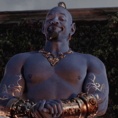 A Statue Of A Man With Blue Paint On His Torso And Arms GIF