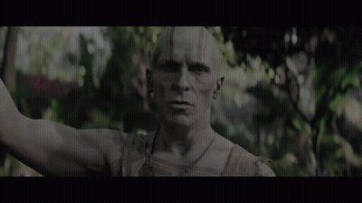 A Statue Of A Man With The Words All Gods Will Die Below It GIF
