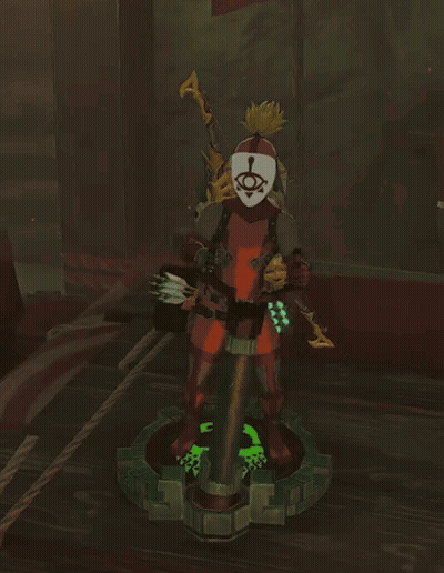 A Statue Of A Person With A Mask On Their Head GIF