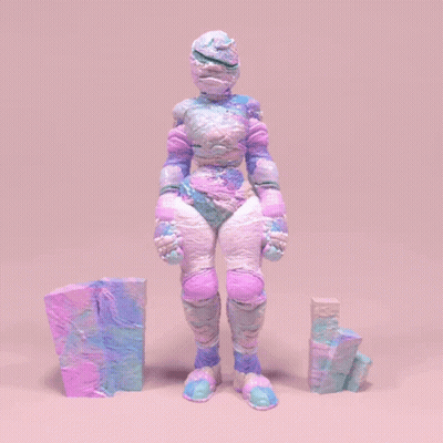 A Statue Of A Person With A Purple And Blue Costume GIF