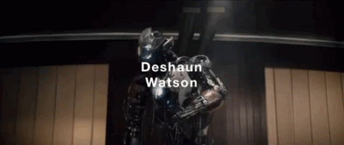 A Statue Of A Robot With The Name Deshawn Watson On It GIF