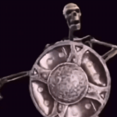 A Statue Of A Skeleton Holding A Shield With A Black Background GIF