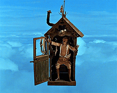 A Statue Of A Woman In A Birdhouse Flying Through The Air GIF