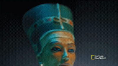 A Statue Of A Woman With A National Geographic Logo In The Corner GIF