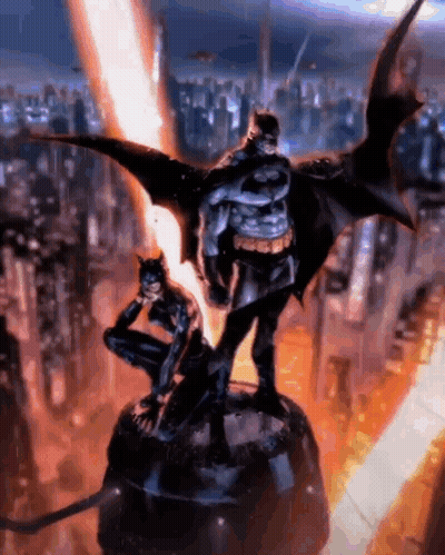 A Statue Of Batman And Catwoman Standing Next To Each Other In Front Of A City . GIF