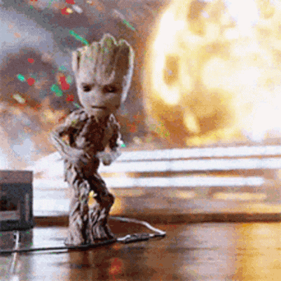 Groot Statue Standing Before Explosion GIF