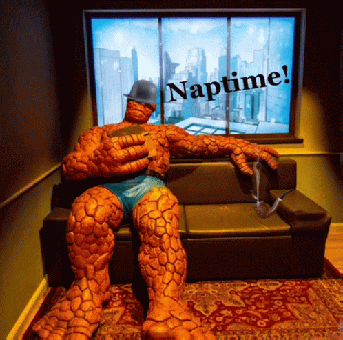A Statue Of The Thing Is Sitting On A Couch With Naptime Written On The Bottom GIF