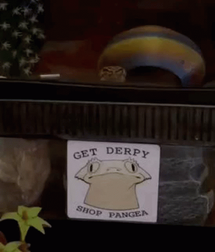 A Sticker With A Lizard On It That Says `` Get Derpy Shop Pangea '' . GIF