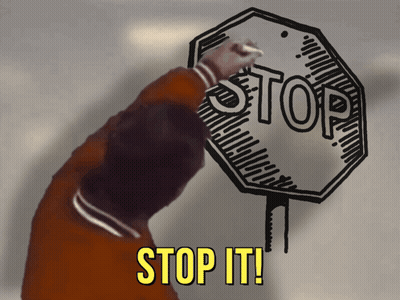 A Stop Sign Is Being Painted On A Window With The Words Stop It Written Below It GIF