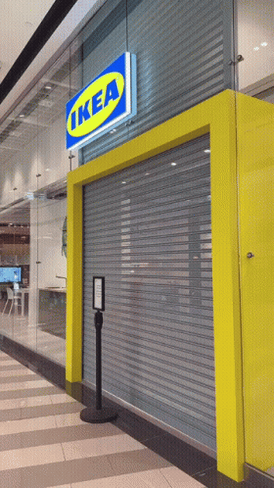 A Store Front With A Sign That Says Ikea On The Top GIF