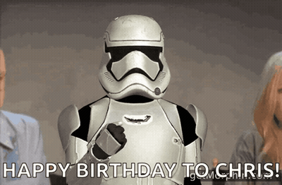 A Storm Trooper Says " Happy Birthday To Chris " In Front Of People GIF