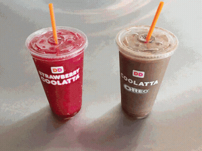 A Strawberry Coolatta And An Oreo Coolatta Sit On A Table GIF