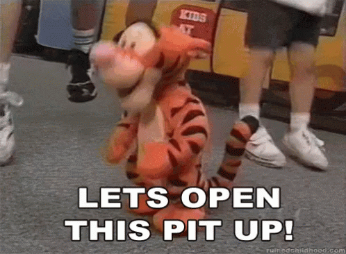 A Stuffed Animal In A Tigger Costume Is Kneeling Down And Saying Lets Open This Pit Up . GIF
