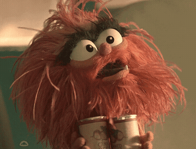 A Stuffed Animal Is Holding A Can Of Beer With A Straw In Its Mouth GIF