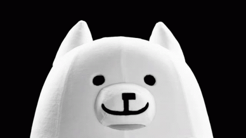 A Stuffed Animal Is Holding A Nintendo Switch With A Pixelated Dog On The Screen GIF