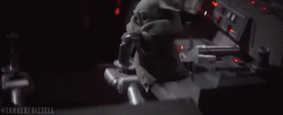 A Stuffed Animal Is Sitting In The Driver 'S Seat Of A Car . GIF