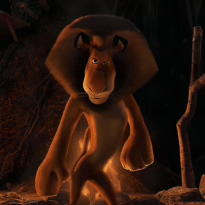 A Stuffed Animal Is Standing In Front Of A Campfire GIF