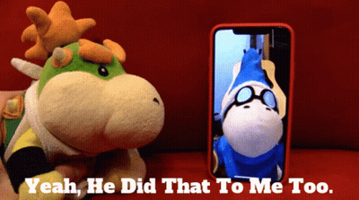 A Stuffed Animal Next To A Cell Phone That Says " Yeah He Did That To Me Too " GIF