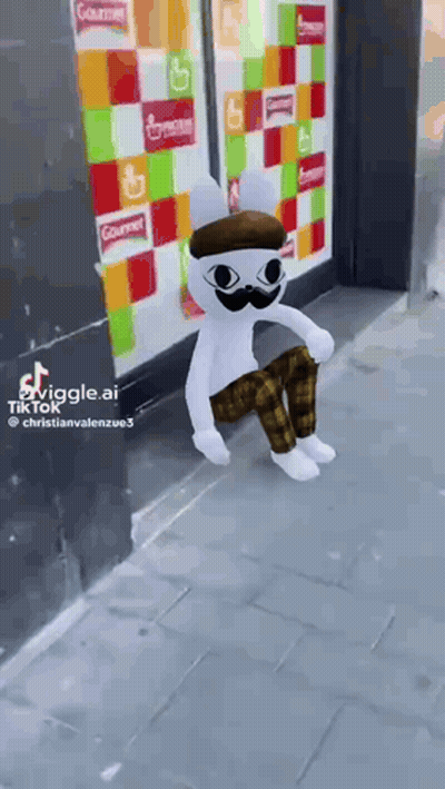A Stuffed Animal Wearing A Hat And A Mustache Is Sitting On The Sidewalk . GIF