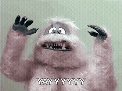 A Stuffed Animal With A Beard And Claws Is Making A Funny Face . GIF
