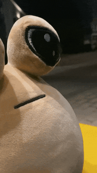 A Stuffed Animal With A Black Eye And A White Nose GIF
