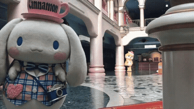 A Stuffed Animal With A Cinnamon Hat On GIF