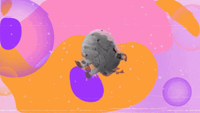 A Stuffed Animal With A Smiley Face And Black Spots On It GIF