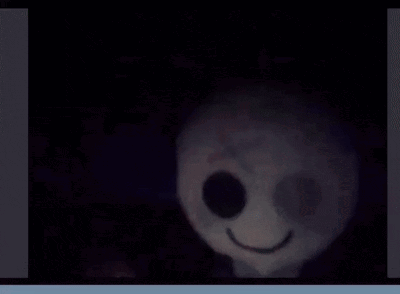 Smiling Stuffed Animal With Big Eyes GIF