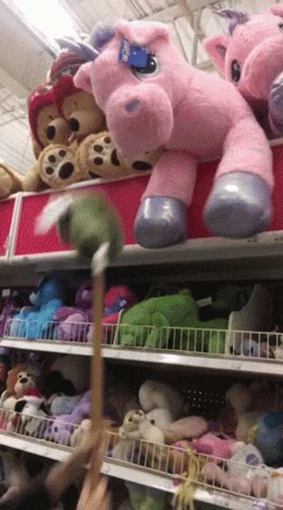 A Stuffed Animal With A Tag That Says Build A Bear On It GIF