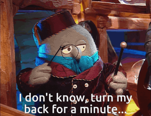 A Stuffed Animal With Glasses And A Top Hat Says I Don T Know Turn My Back For A Minute GIF