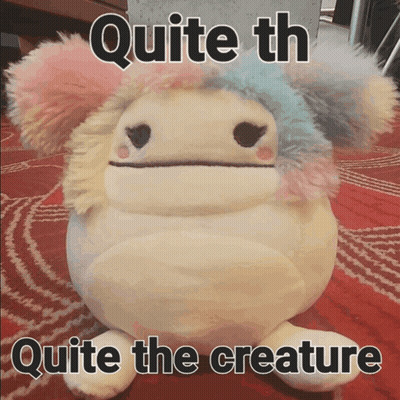 A Stuffed Animal With The Words Quite Th Quite The Creature Written On It GIF