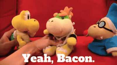 A Stuffed Animal With The Words Yeah Bacon On The Bottom GIF