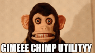 A Stuffed Chimp Says Gimeee Chimp Utilityy In Front Of A Wall . GIF